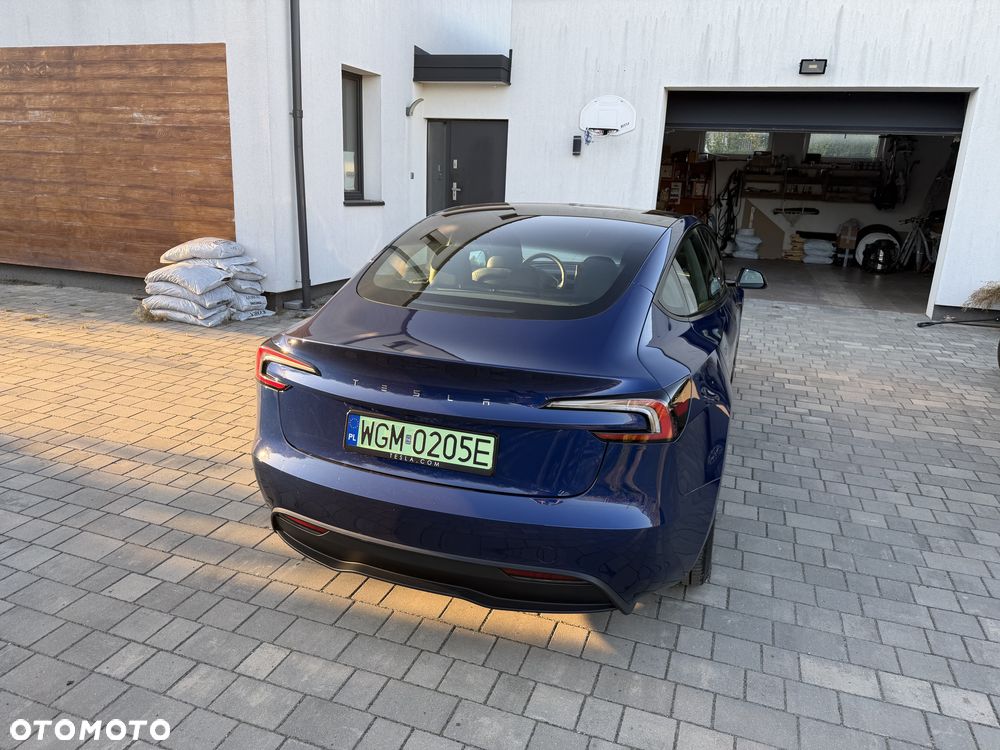 Tesla Model 3 2023 photo 4