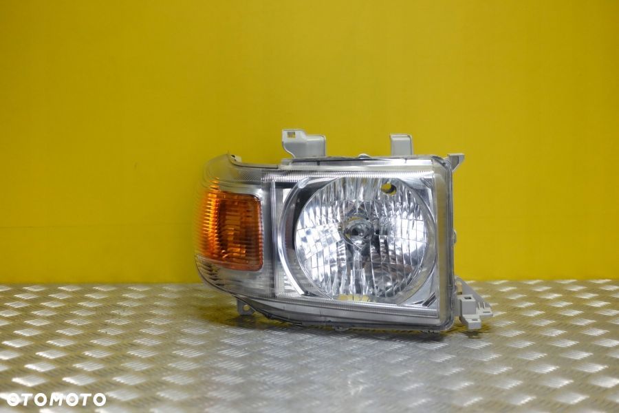 TOYOTA LAND CRUISER 70 HZJ70 2007- REFLEKTOR R USA - 1