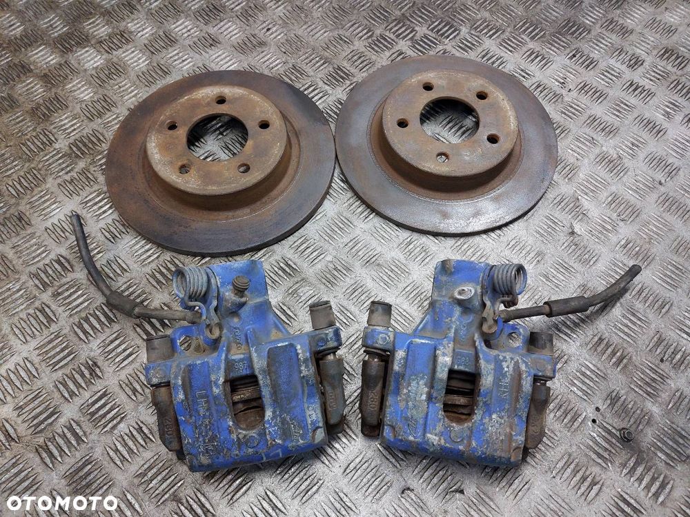 TARCZE HAMULCOWE TYŁ + KLOCKI + ZACISKI VOLVO S40 II V50 - 1