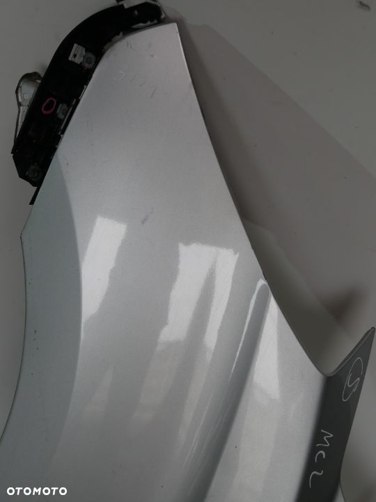 BŁOTNIK PRZEDNI LEWY HYUNDAI H1 I800 07-15 MCL - 2