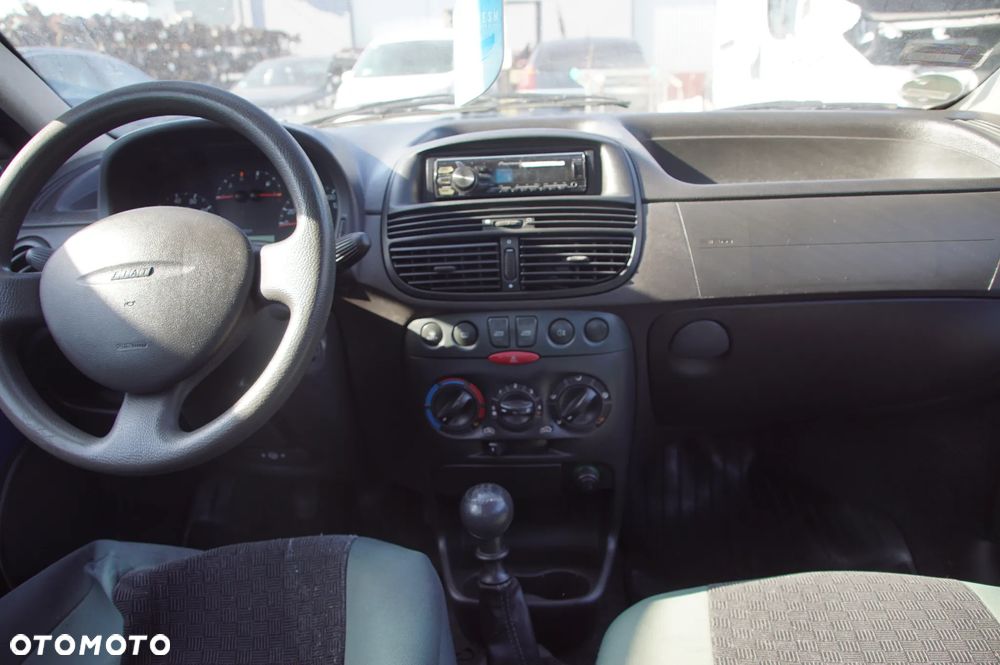 Auto na części - Fiat Punto II 1.2 8V 60 KM 188A4000 2003R Silnik Skrzynia Drzwi Maska Klapa Zderzak Błotnik Szyba Lusterko Deska Kokpit Sterownik Moduł Licznik Kierownica - 14