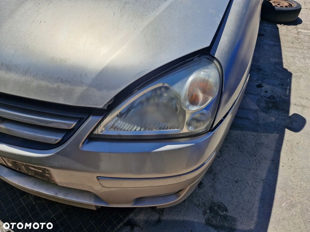 Lampa przód prawa lewa SUZUKI LIANA - 1