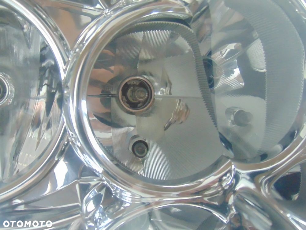 Oryginalna lampa przednia przód prawa Chrysler Voyager 4 IV FL 04-07r - 4