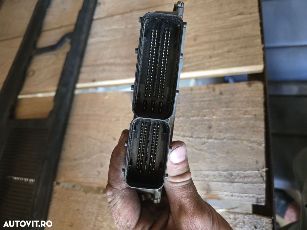 Calculator motor 2.0 BKP passat B6  03G906018 - 2