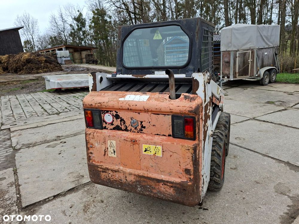 Bobcat 553 4X4 + Melroe Ingersoll-Rand 725S B/H - 6