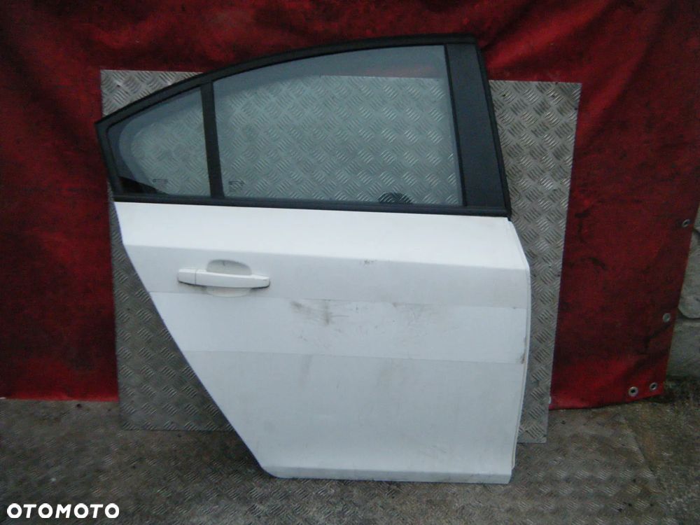 CHEWROLET CRUZE DRZWI TYŁ PRAWE TYLNE GAZ SEDAN  =RADOM