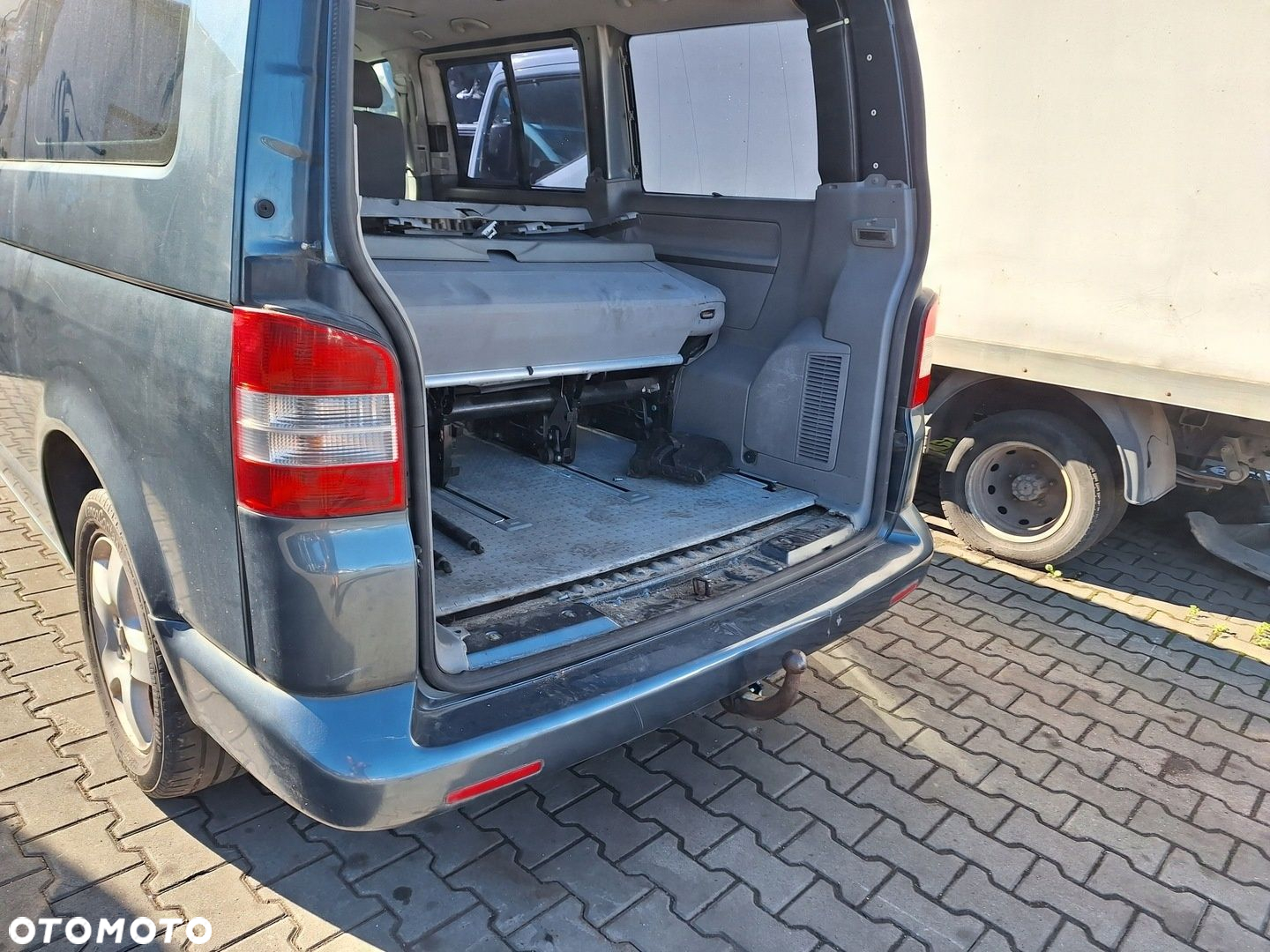 VW TRANSPORTER T5 MULTIVAN ZDERZAK TYŁ LD7U 7HM - 2