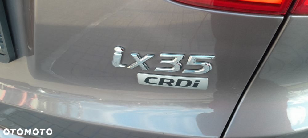 Hyundai ix35 1.7 CRDi 2WD blue Finale Gold - 35