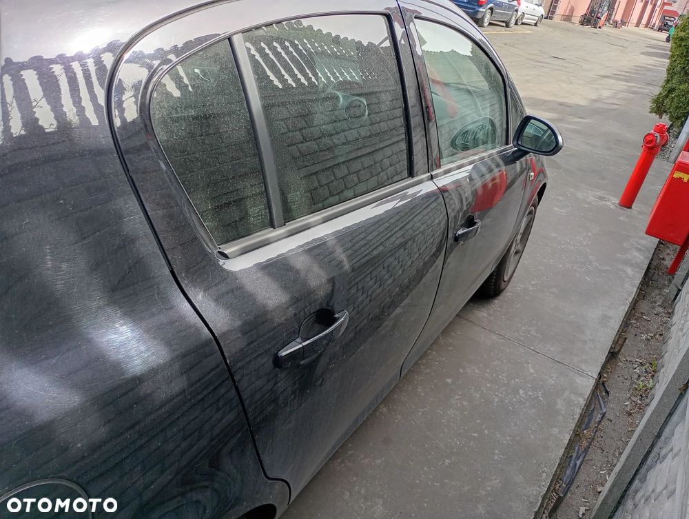 OPEL CORSA D 06-11 1.2 16V Z12XEP OSŁONA PRZECWSŁONECZNA PRAWA LEWA - 16