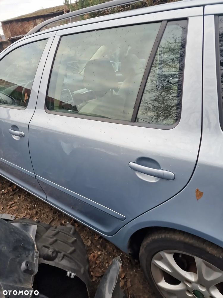 Drzwi lewy tył skoda octavia II lift kombi w kolorze 9452 - 1