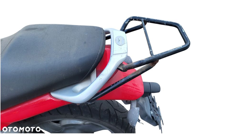 Moto Guzzi Breva 750 ie reflektor lampa czasza owiewka wypełnienie licznik błotnik kierownica lusterko manetka felga tarcza zacisk pompa zawieszenie silnik moduł regulator zbiornik siedzenie set podnóżek stelaż stopka chłodnica tłumik - 6
