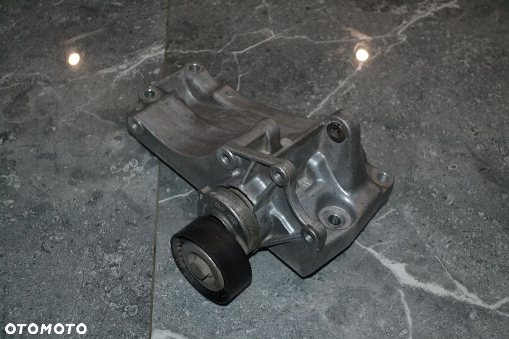 VW AUDI SEAT SKODA WSPORNIK MOCOWANIE ALTERNATORA ŁAPA 030145169H