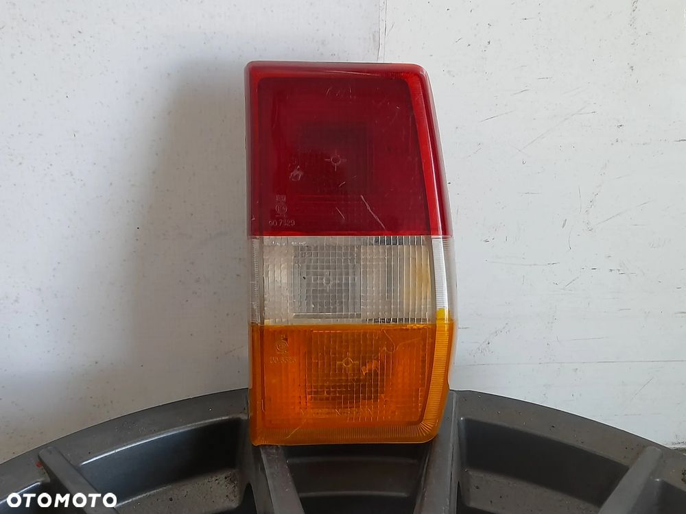 Lampa prawy tył Ford Fiesta MK2 Ford OE 84FG13A602AA