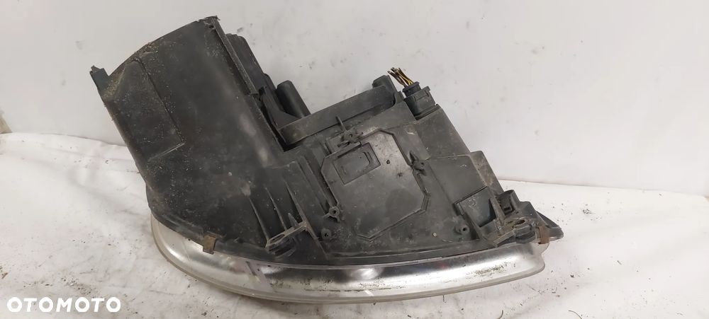 .  PRZOD PRZEDNIA LAMPA LEWA  VOLKSWAGEN TOURAN / CADDY - 6