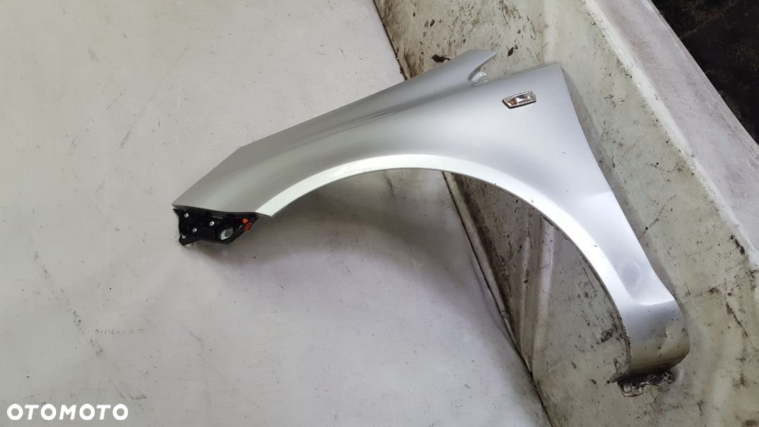 * BŁOTNIK PRZÓD PRZEDNI LEWY OPEL CORSA D Z157 SREBRNY - 3