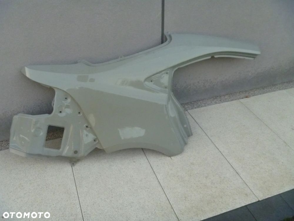 TOYOTA COROLLA E21 SEDAN NOWY BŁOTNIK TYLNY PRAWY LEWY  ORYGINAŁ - 9