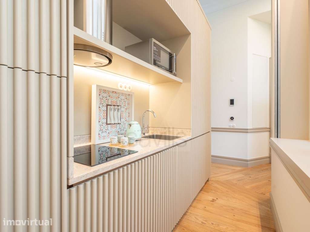 Apartamento T0 mobilado e decorado na Avenida dos Aliados - Grande imagem: 4/28