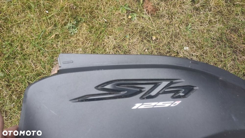 EU OWIEWKA LEWA OGON HONDA SH 125 17- - 2