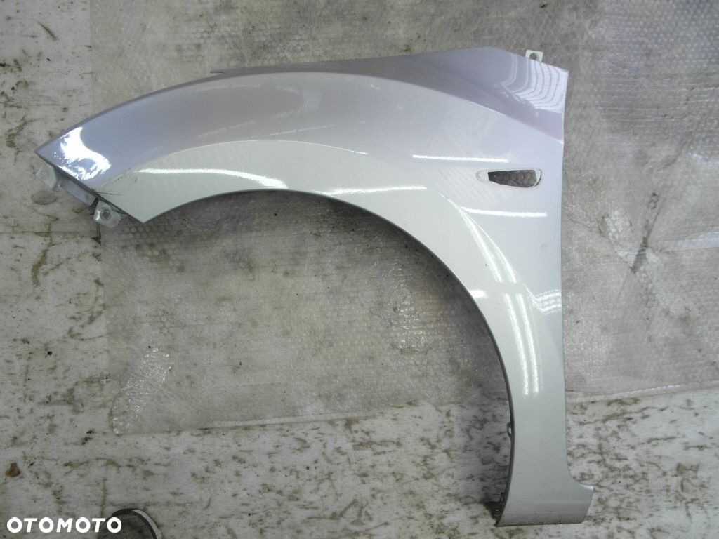 HYUNDAI I30 II BŁOTNIK PRZEDNI LEWY - 1
