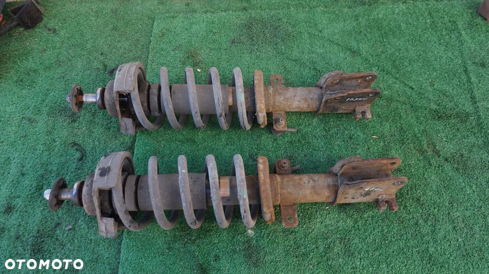 Renault Trafic II Opel Vivaro Nissan Primastar 2.0 DCI mcpherson amortyzator przod przedni lewy prawy