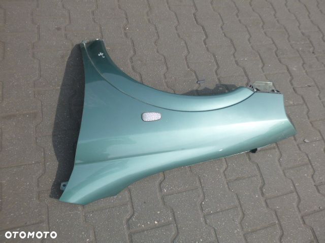 BŁOTNIK LEWY PRZÓD LEWY PRZEDNI OPEL ASTRA II G Z374 - 6