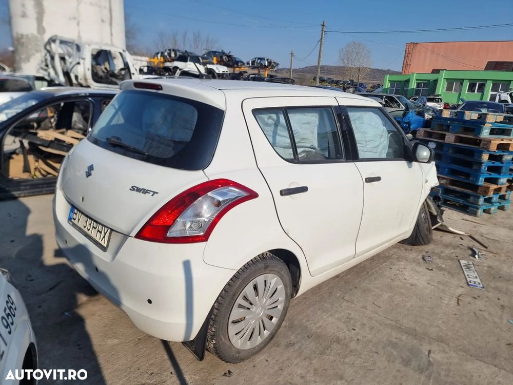 ansamblu stergatoare macara motoras geam broasca stanga dreapta fata spate bara spate haion portbagaj stop tripla oglinda usa portiera stanga dreapta timonerie ceasuri bord spira volan torpedou vas expansiune antigel  bancheta spate scaune fata grile ventilatie bord Suzuki Swift 4 facelift, an 2016, motor 1.2 benzina 94 cp cod Z12B, cutie de viteze manuala 5+1 trepte - 2