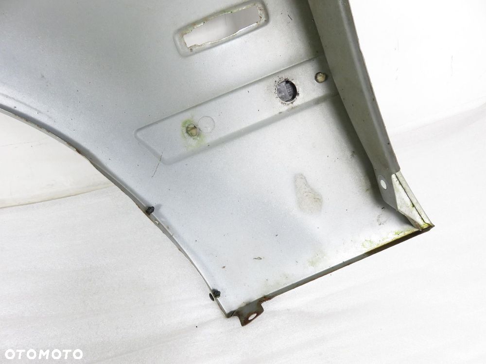 BŁOTNIK PRAWY PRZEDNI BMW E39 - 4