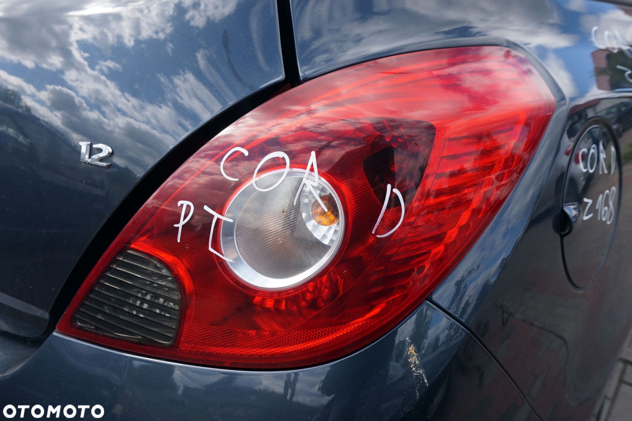 LAMPA TYLNA PRAWA CORSA D IV 3D HB 93189091 OPEL 2006-2011 - 1