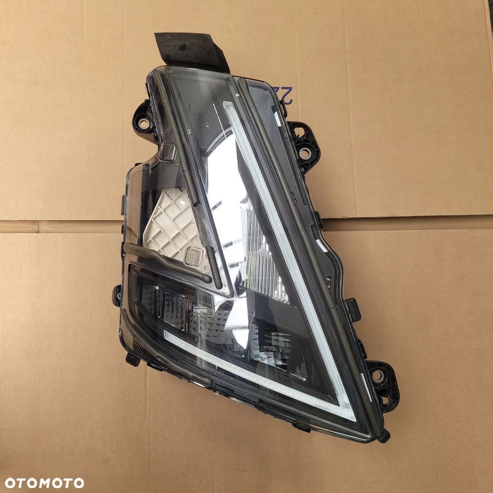 LAMPA PRAWA VOLVO FH5 FH16 24056526 ORYGINAŁ - 1