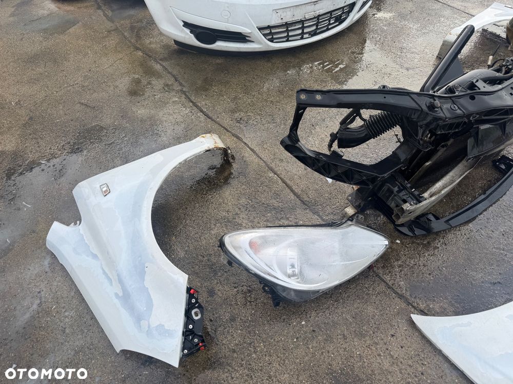 Opel Corsa D biała maska drzwi prawe lewe przednie przód pas przedni chłodnice wody klimy lampy lampa przednia prawa lewa błotnik prawy lewy biały białe zderzak przód przedni klapa bagażnika klapa tył tylnia lampa prawa lewa belka pod zderzak - 3