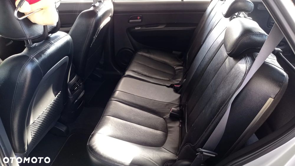 Kia Carens 2.0 CVVT EX - 11