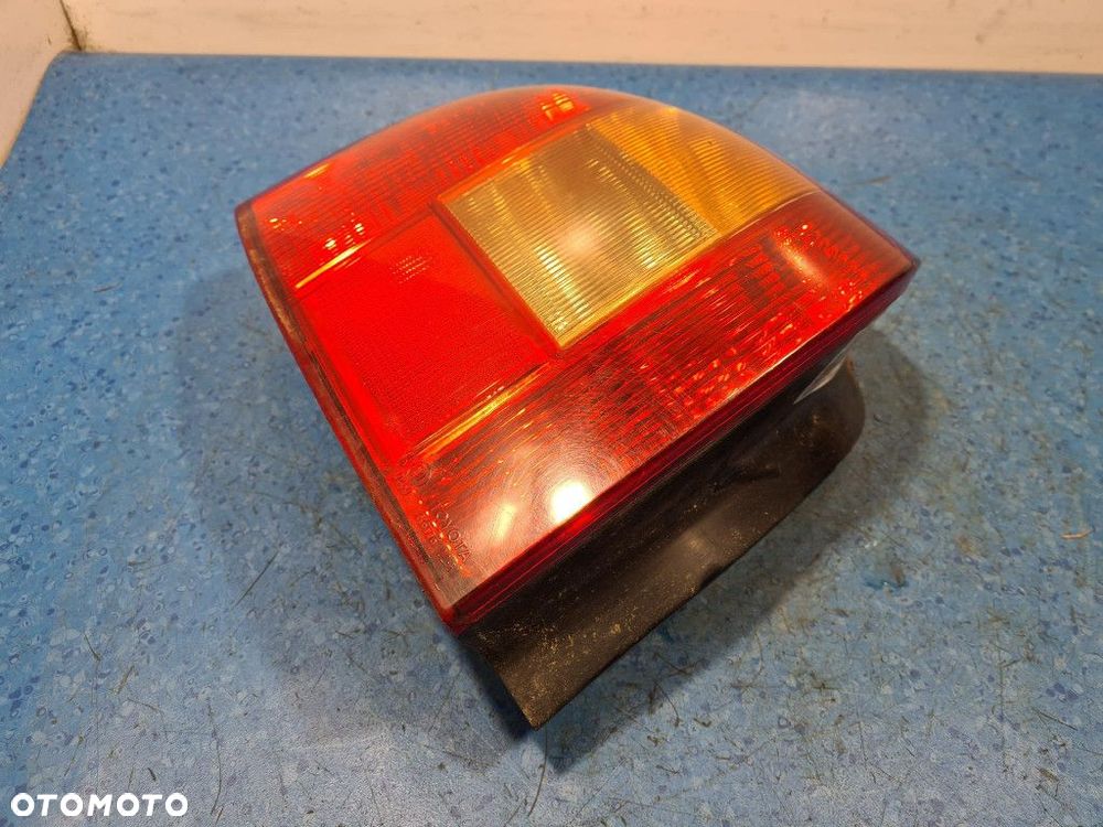 TOYOTA COROLLA E12 HB LAMPA TYŁ LEWA ZEWNĘTRZNA - 6
