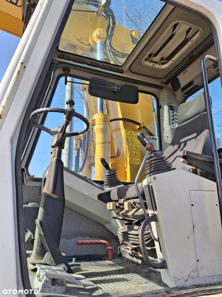 Liebherr A312 CAT JCB - 4