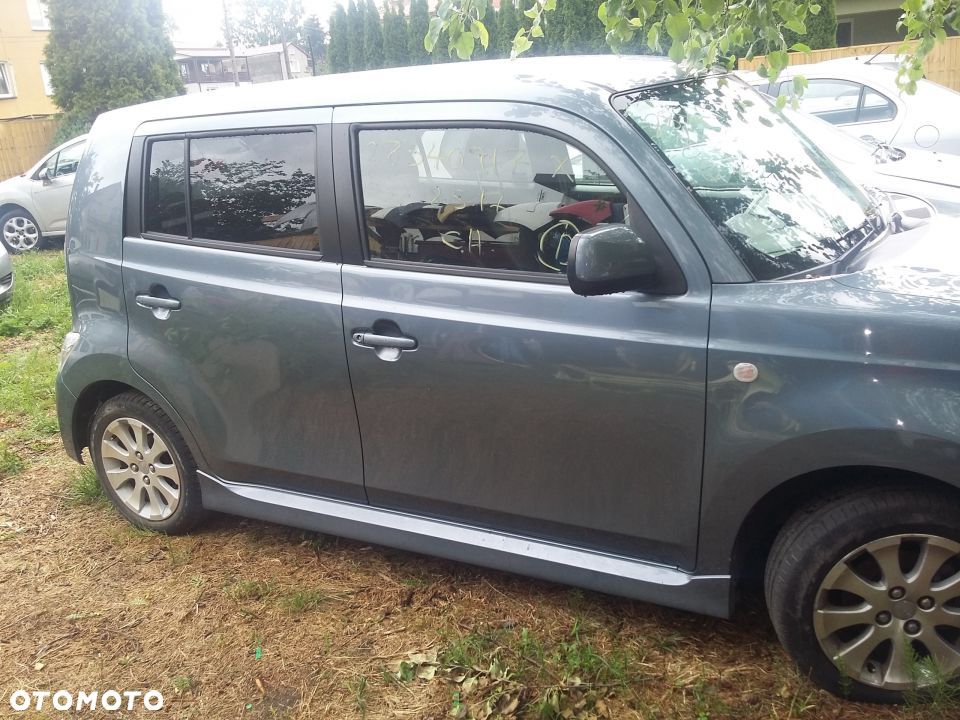 Drzwi prawe przód przednie daihatsu Materia S30