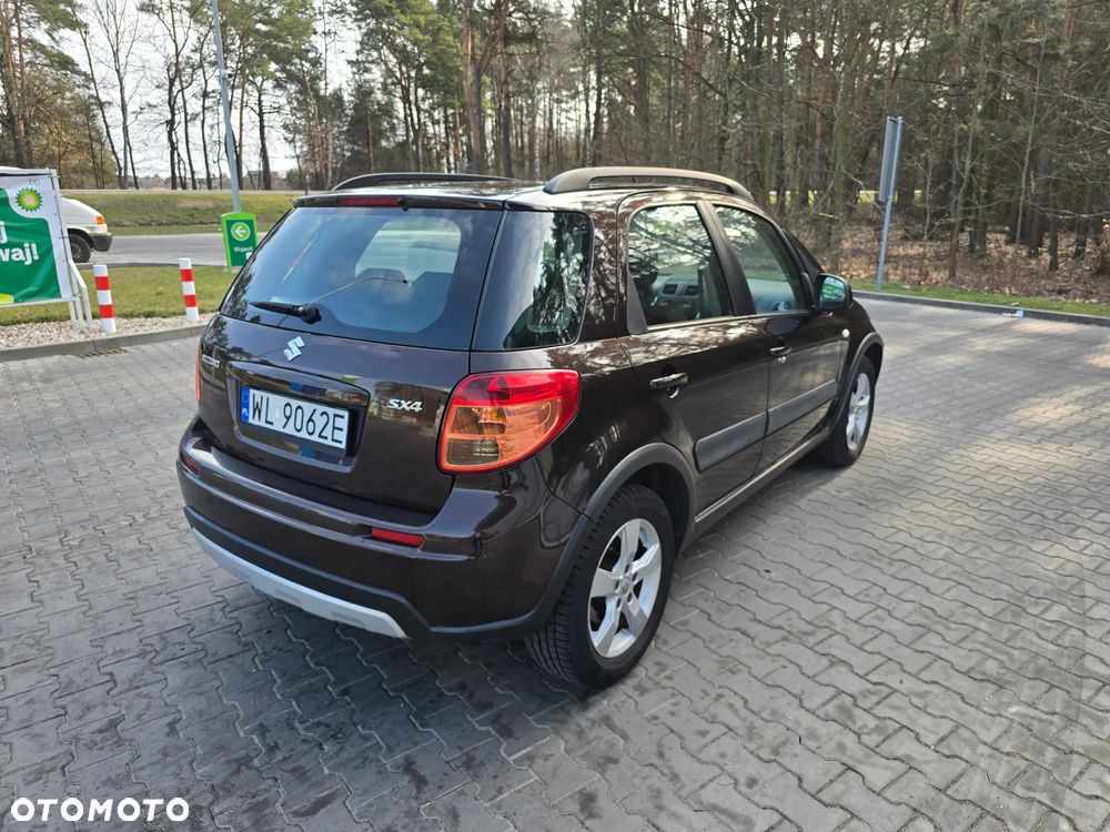 Suzuki SX4 1.6 Comfort Plus - 4