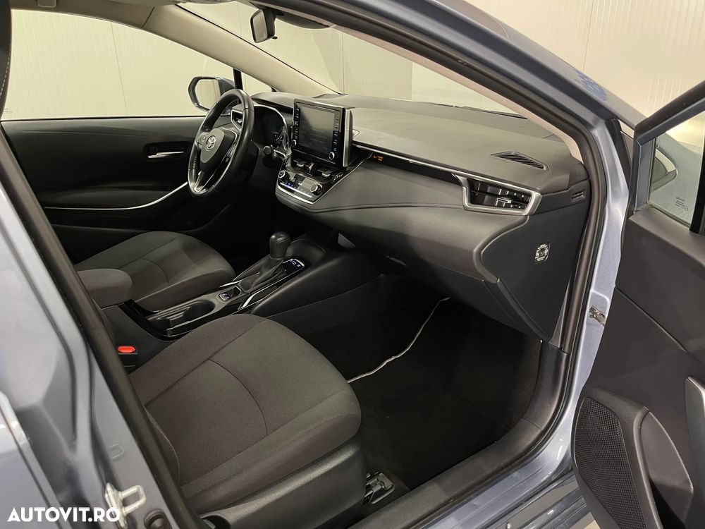 Toyota Corolla Sedan 1.8 HSD Business - 9