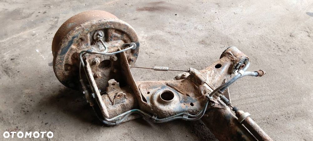 BELKA OŚ ZAWIESZENIA TYŁ BĘBNY Z ABS OPEL CORSA C HB 3D - 3