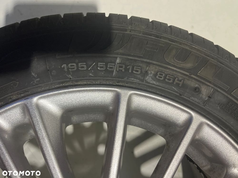 Felga aluminiowa +OPONA Ford FIESTA 6.0" x 15" 4x108 ET 47,5 - 2