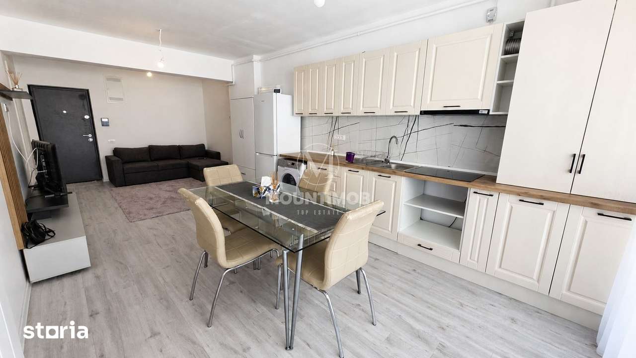 Studio spatios 42,67 mp + balcon 9 mp, Etaj 2 | Parcare subterană — fotografia 3