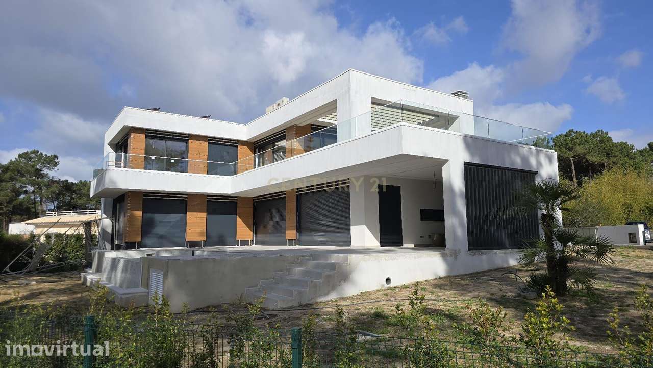 Moradia de luxo na Herdade da Aroeira com piscina transbordante e jacu - Grande imagem: 5/22