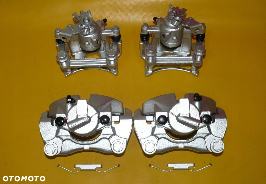 ZACISKI JARZMA LEWY PRAWY PRZÓD TYŁ VW TRANSPORTER T5 308/29,5 294/22mm 03- - 9