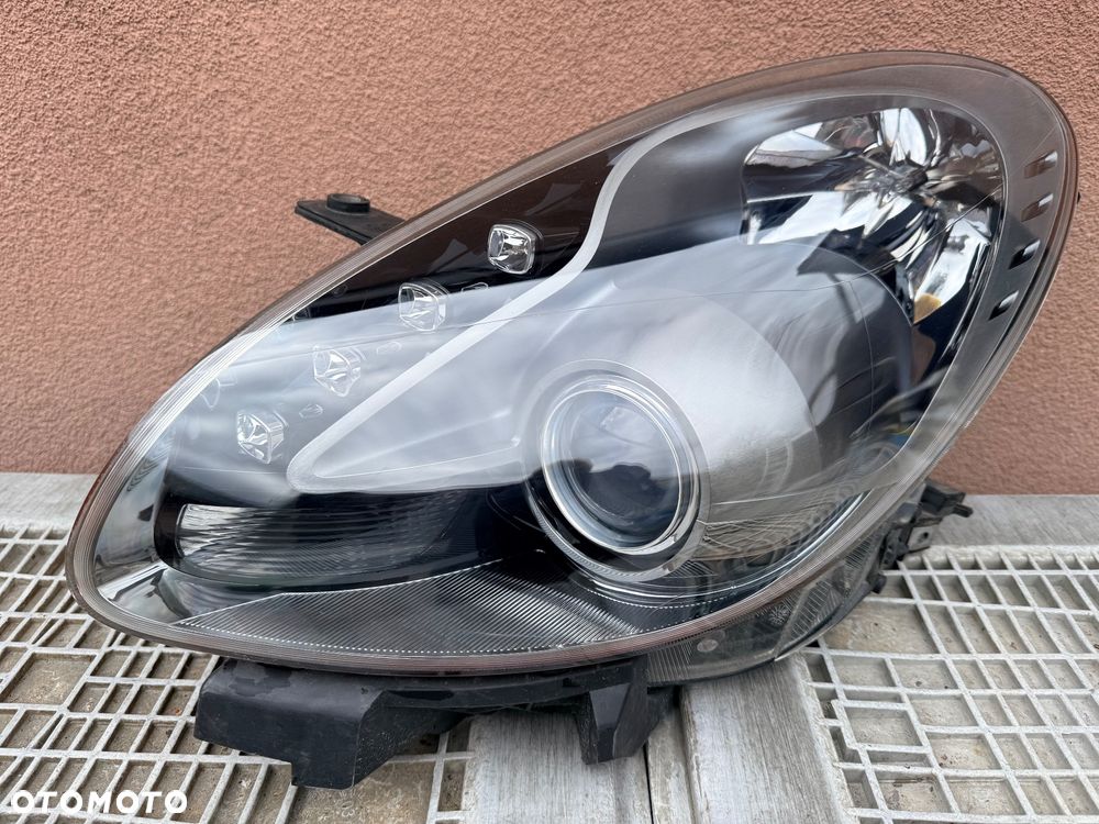Lampa przednia ALFA ROMEO GIULIETTA ZWYKŁA LED CIEMNA LEWA EUROPA ORG AL - 1