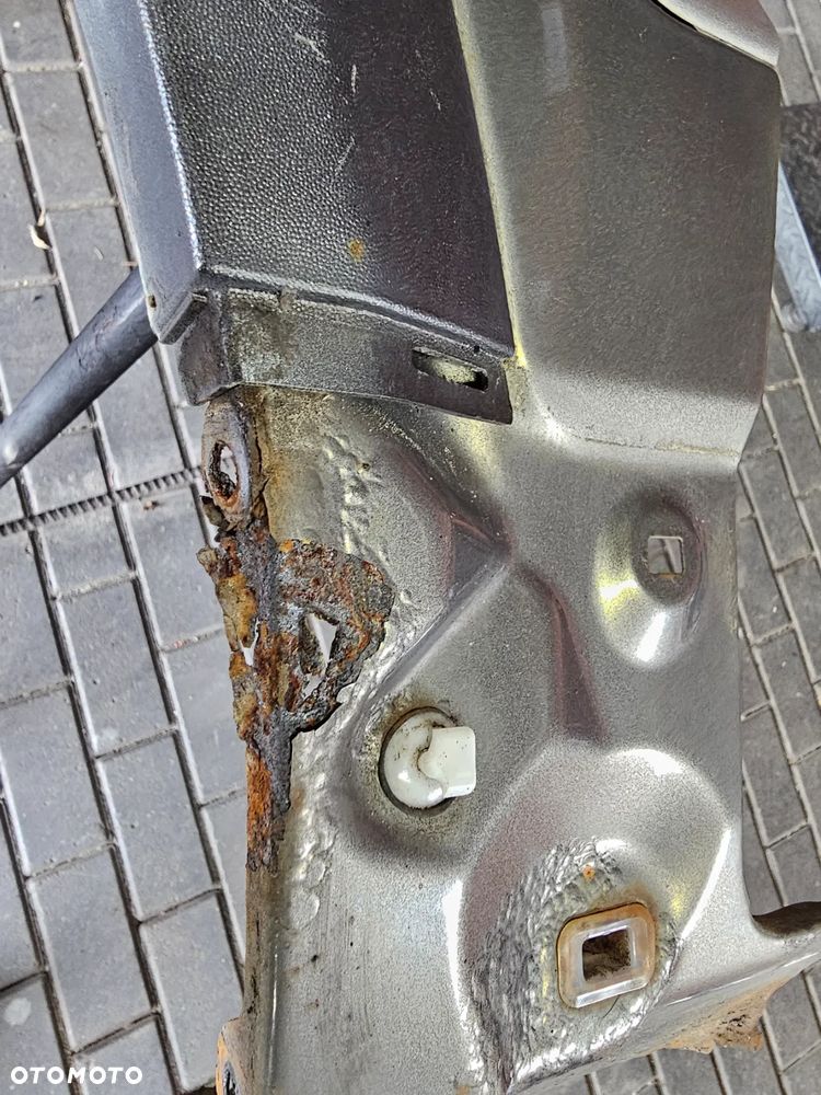 BŁOTNIK LEWY PRZÓD PRZEDNI OPEL ANTARA 79U - 18