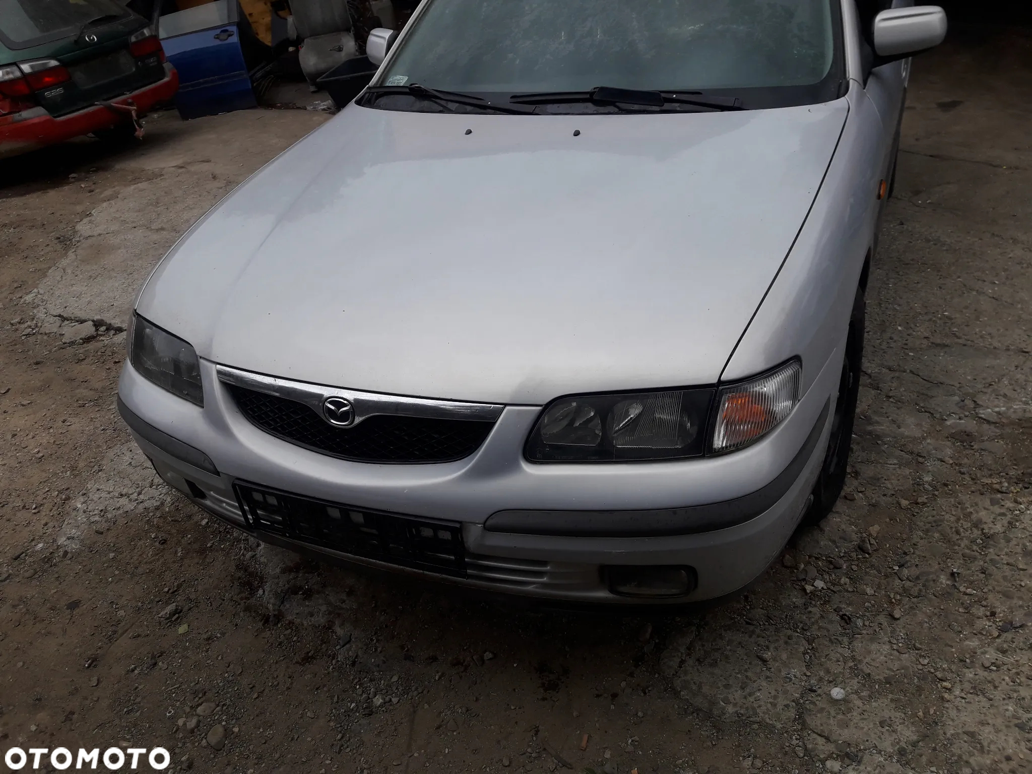 Mazda 626 GF GW 97-02   Maska lampa zderzak pas atrapa 18G 22V - 5