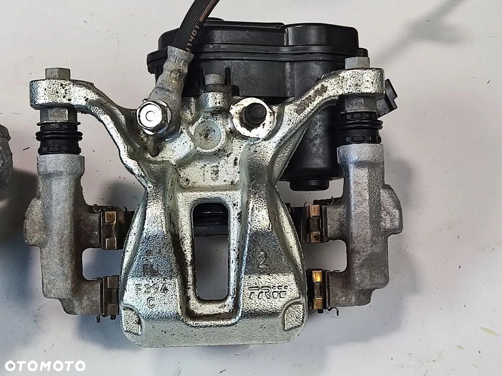 TOYOTA COROLLA E21 1.8h od 2022r Zacisk Hamulcowy Tył Prawy Lewy - 2