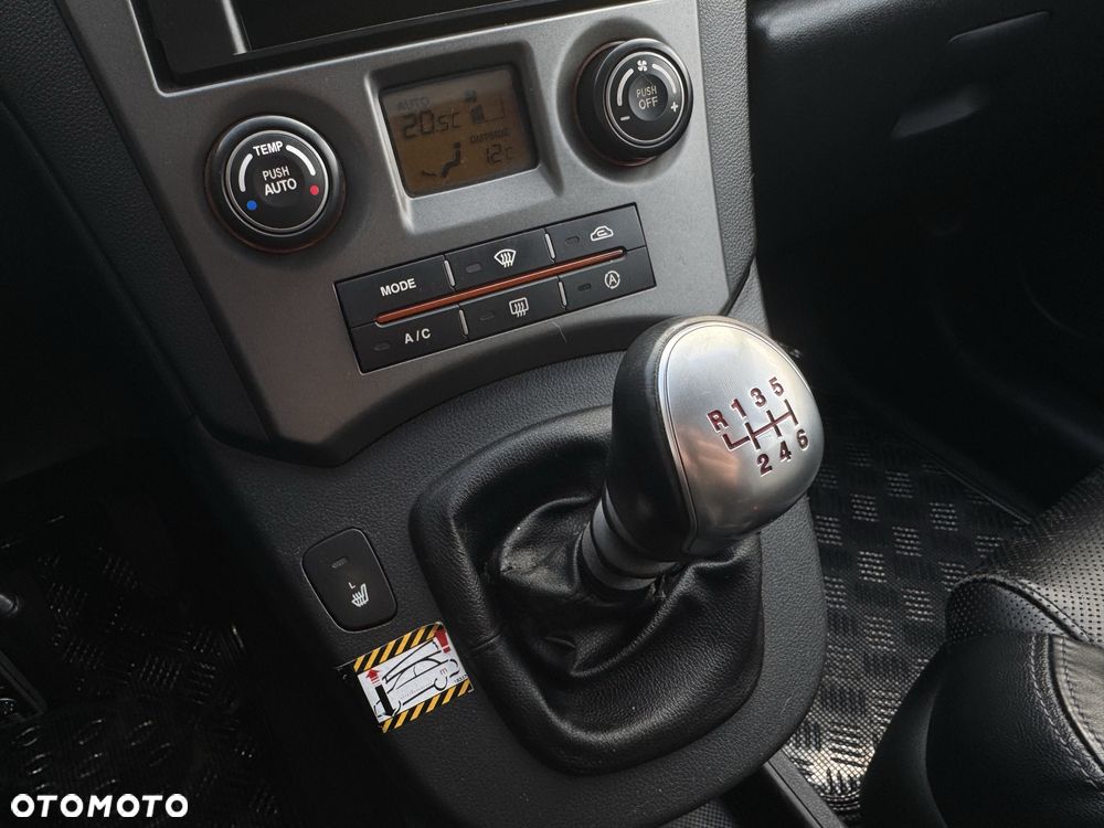 Kia Carens - 8