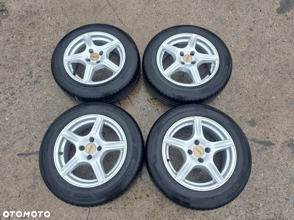 Koła Felgi Aluminiowe alusy 15 cali 4x100 Opel Corsa D - 1