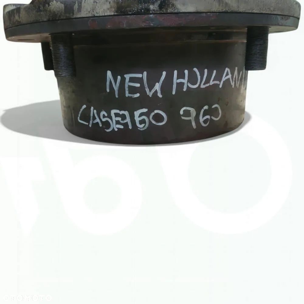 Zwrotnica 6194274M1 Zwolnica 85825032 Piasta 85825037 New Holland LB 115 - 15