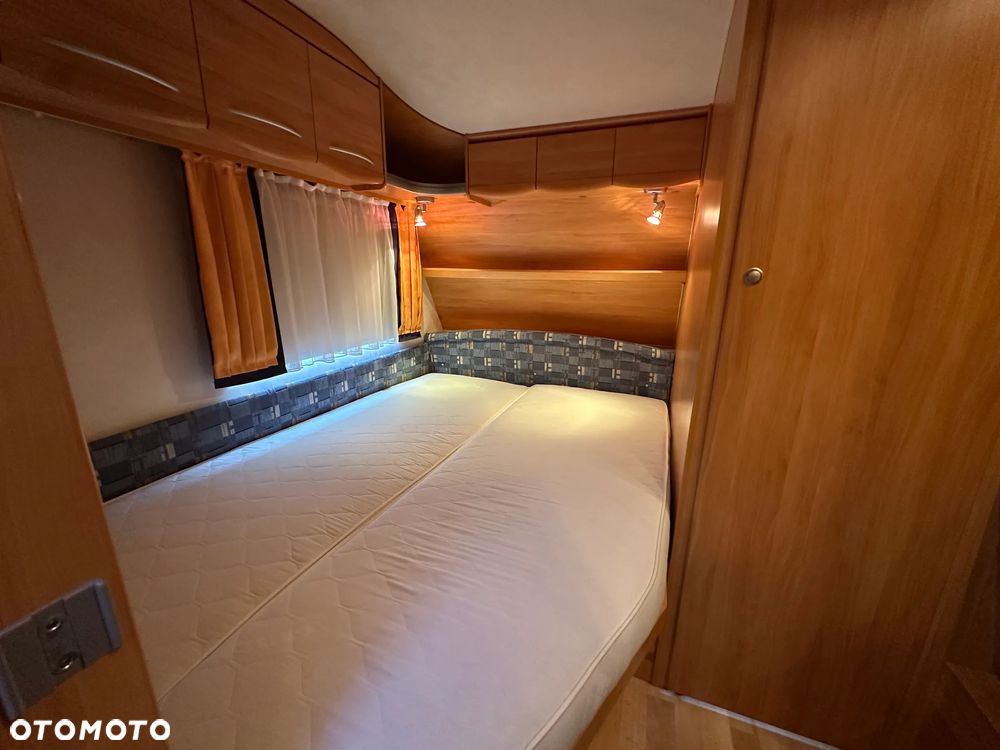 Adria ADORA 542 TK z przedsionkiem Isabella i łóżkami piętrowymi. - 26