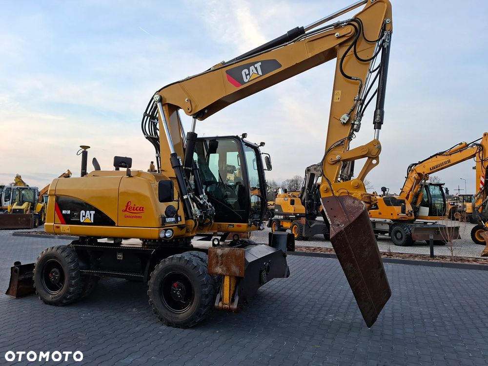 Caterpillar CAT M313D Niwelacja 3D Leica - 11